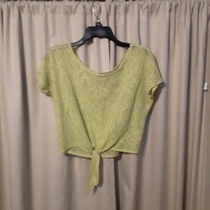 A yellow Kira crop top